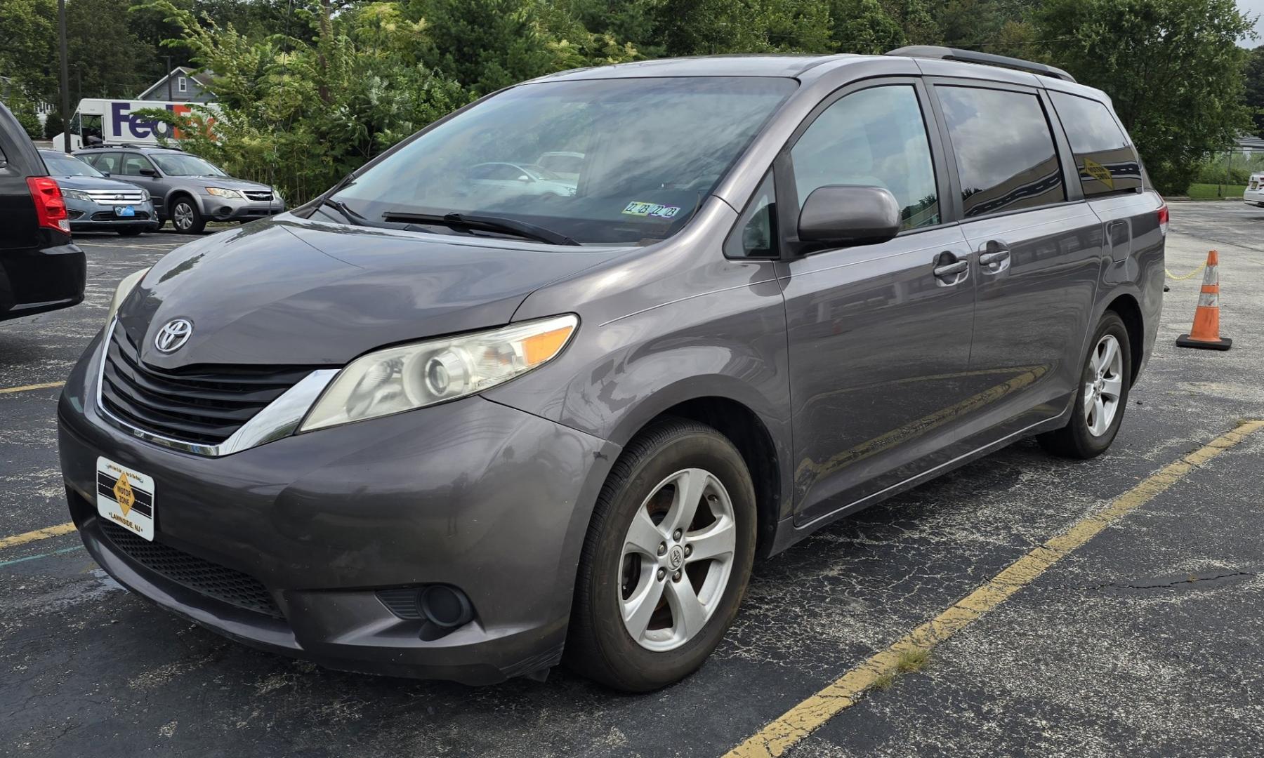 2011 Gray Toyota Sienna LE (5TDKK3DC6BS) with an V6, 3.5 Liter engine, Automatic, 6-Spd w/Overdrive transmission, located at 341 N White Horse Pike, Lawnside, NJ, 08045, (856) 262-9500, 39.855621, -75.027451 - Photo#0