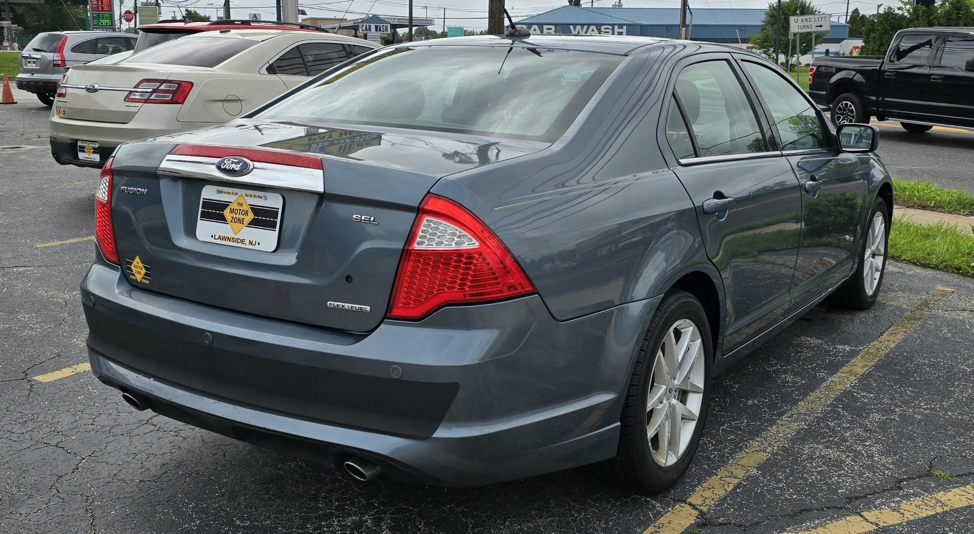 2012 Blue Ford Fusion SEL (3FAHP0JG5CR) with an V6, Flex Fuel, 3.0 Liter engine, Automatic, 6-Spd w/SelectShift transmission, located at 341 N White Horse Pike, Lawnside, NJ, 08045, (856) 262-9500, 39.855621, -75.027451 - Photo#2