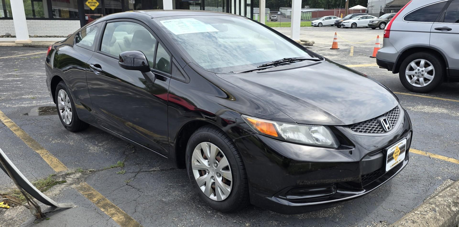 2012 Black Honda Civic LX (2HGFG3B55CH) with an 4-Cyl, VTEC, 1.8 Liter engine, Automatic, 5-Spd transmission, located at 341 N White Horse Pike, Lawnside, NJ, 08045, (856) 262-9500, 39.855621, -75.027451 - Photo#1