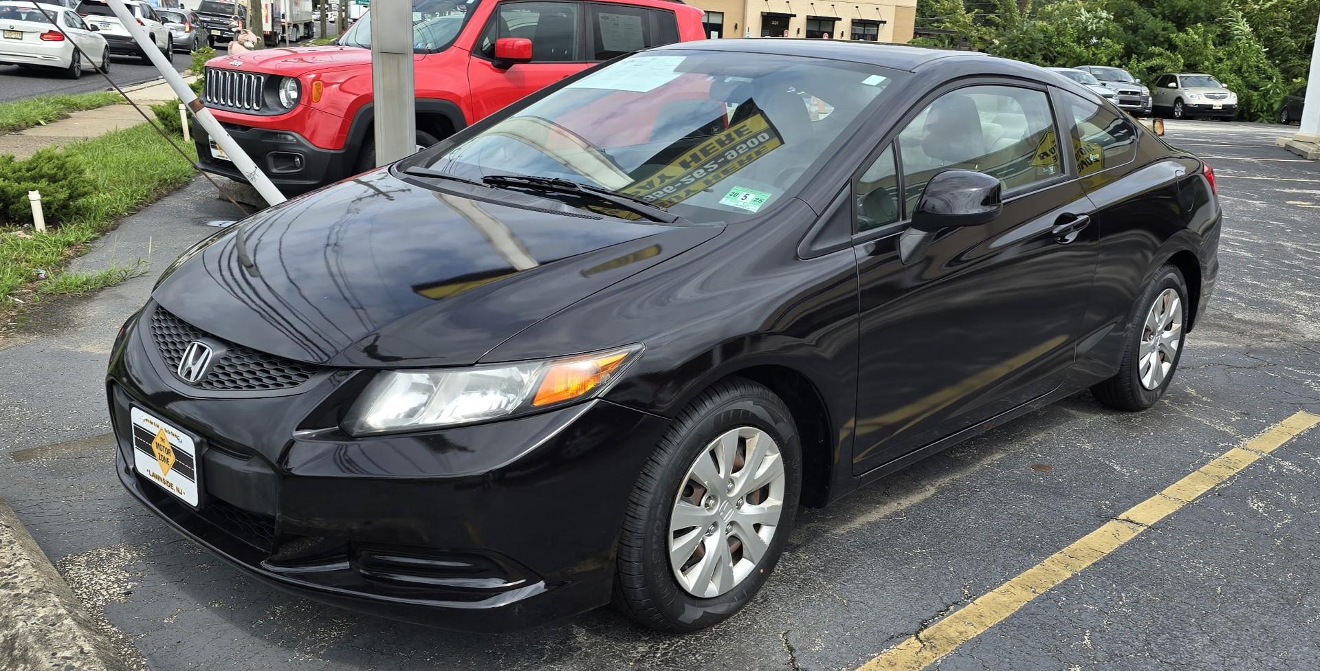 2012 Black Honda Civic LX (2HGFG3B55CH) with an 4-Cyl, VTEC, 1.8 Liter engine, Automatic, 5-Spd transmission, located at 341 N White Horse Pike, Lawnside, NJ, 08045, (856) 262-9500, 39.855621, -75.027451 - Photo#0