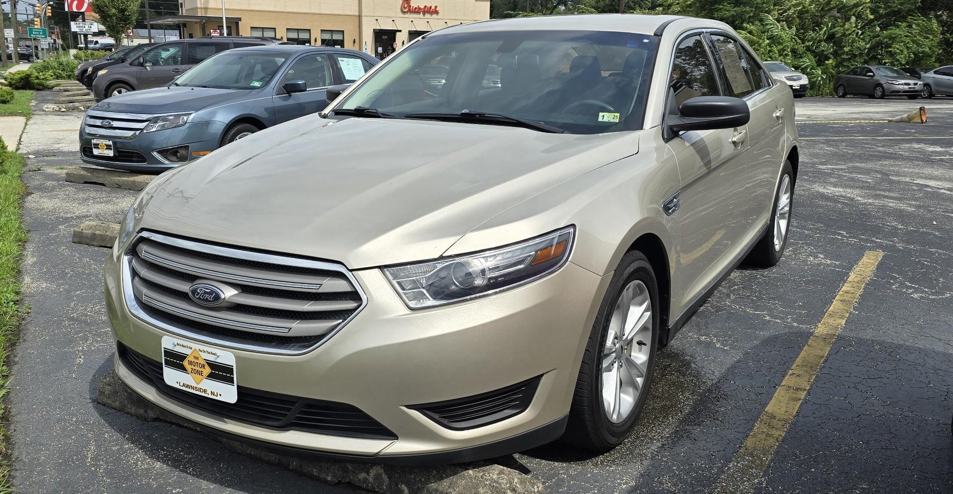 2017 Tan Ford Taurus SE (1FAHP2D85HG) with an V6, 3.5 Liter engine, Auto, 6-Spd w/SelShft transmission, located at 341 N White Horse Pike, Lawnside, NJ, 08045, (856) 262-9500, 39.855621, -75.027451 - Photo#0